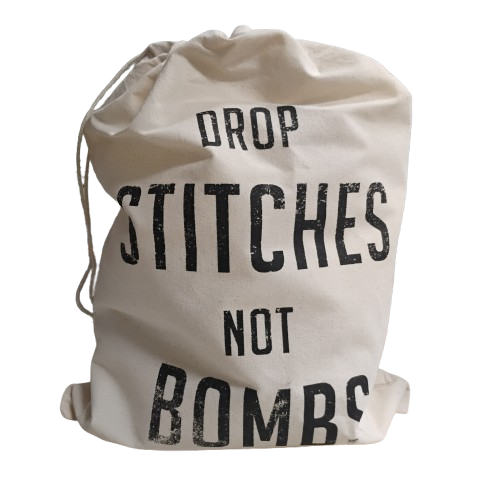 Drop Stitches Not Bombs Drawstring Bag 